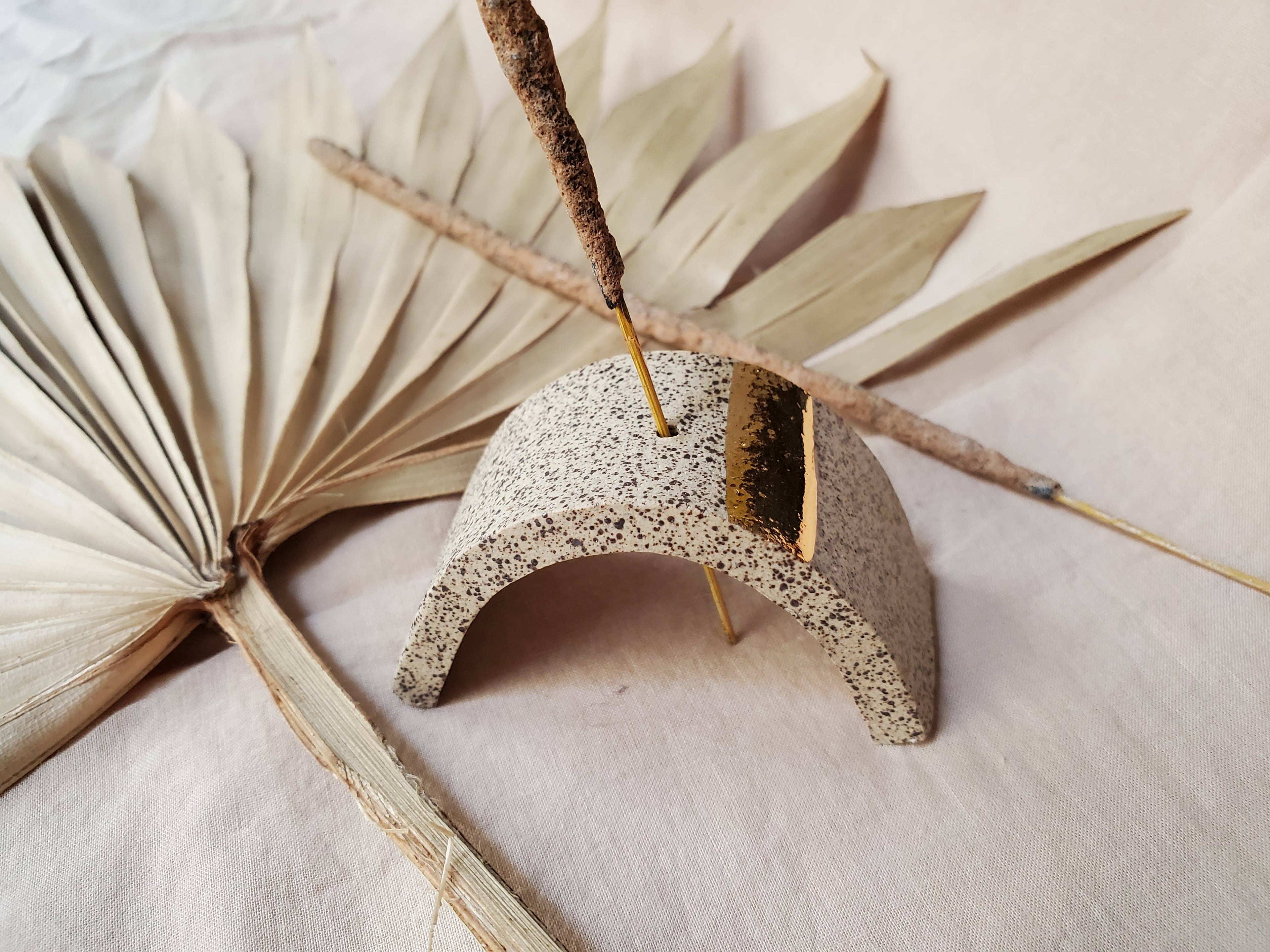 gray incense arch